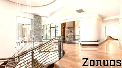 Henderson mega-mansion with ‘bedrooms like hotel suites’ hits the market for $14.95M